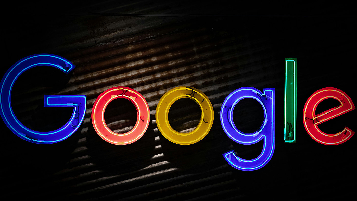 Google logo on a black background